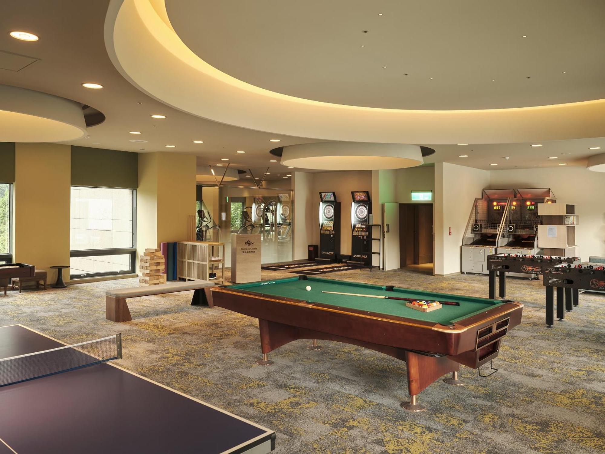 Fleur De Chine Hotel Yuchi Exterior photo The game room at the clubhouse